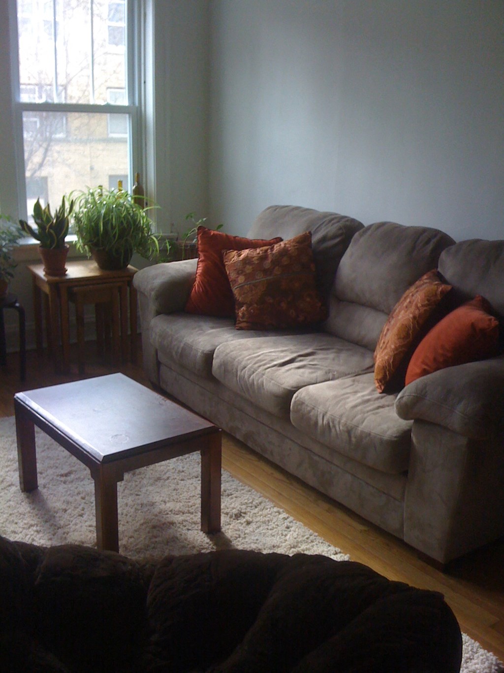 a living room with a couch and a coffee table
