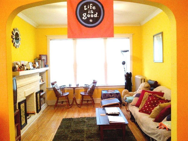 a living room with a couch and a table