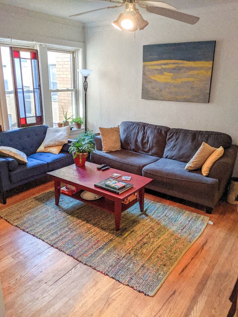 a living room with a couch and a coffee table