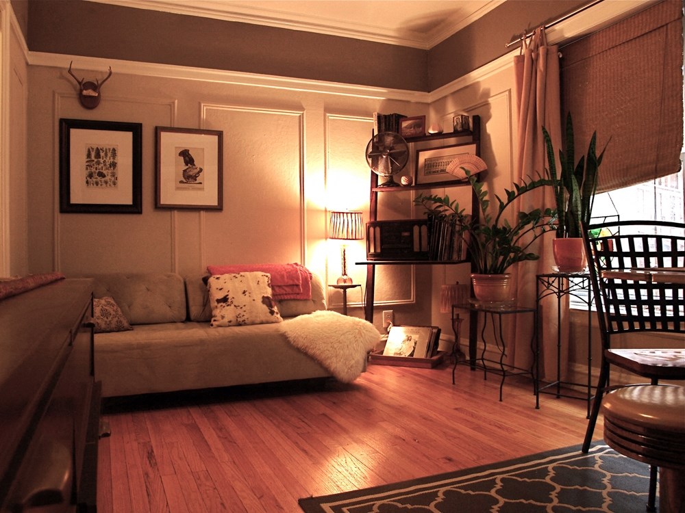 a living room with a couch and a table