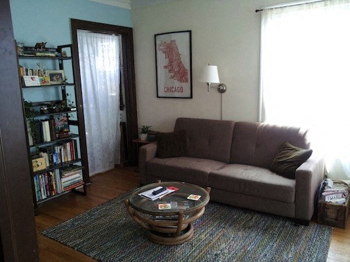 a living room with a couch and a coffee table