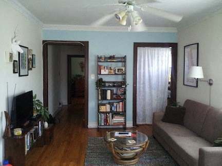a living room with a couch and a table