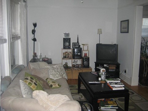 a living room with a couch and a television