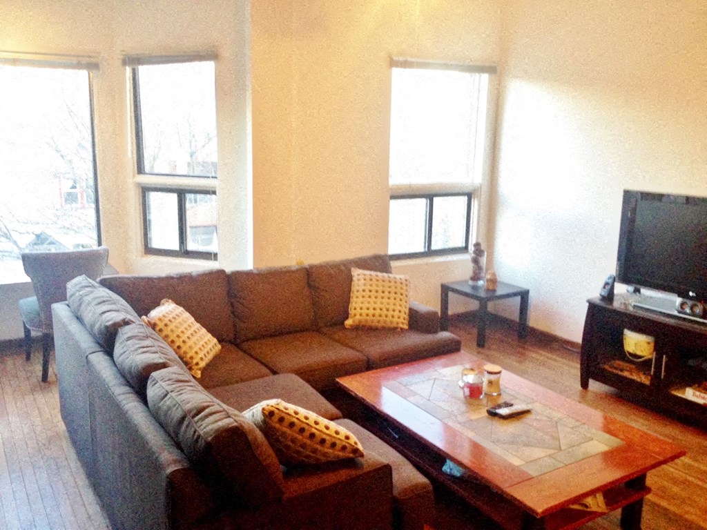 a living room with a couch and a coffee table