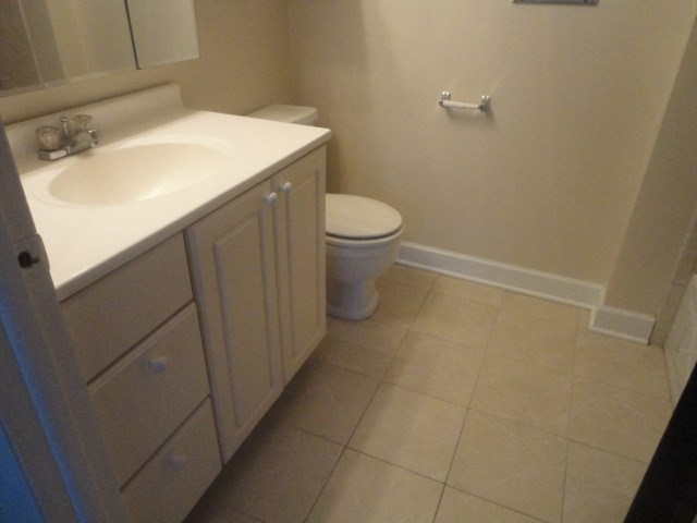 a bathroom with a sink and a toilet