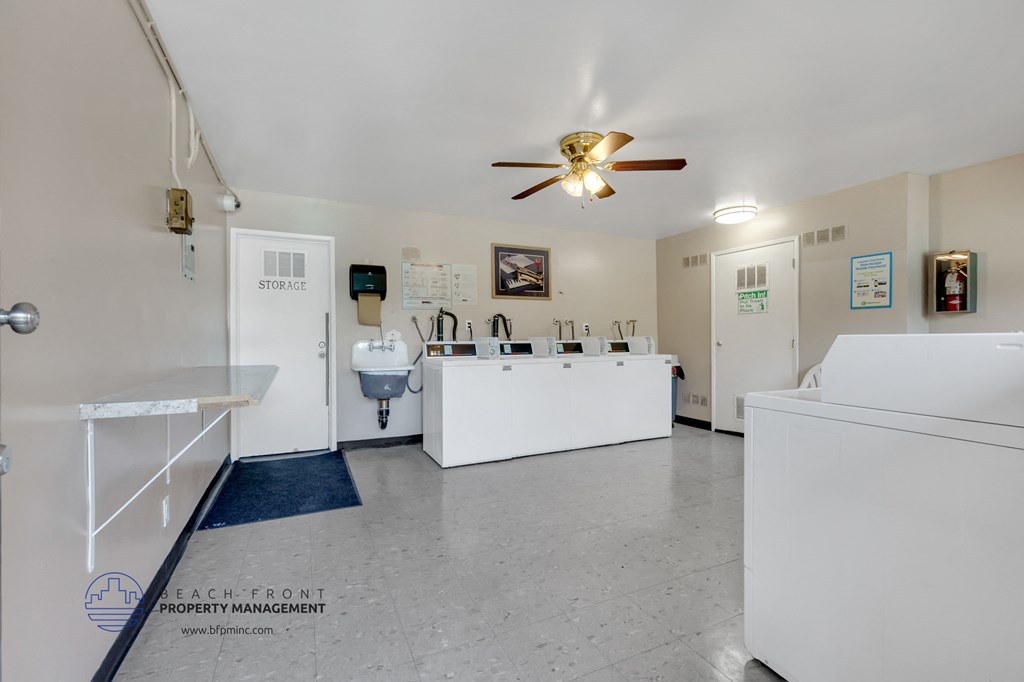 a laundry room with a washer and dryer