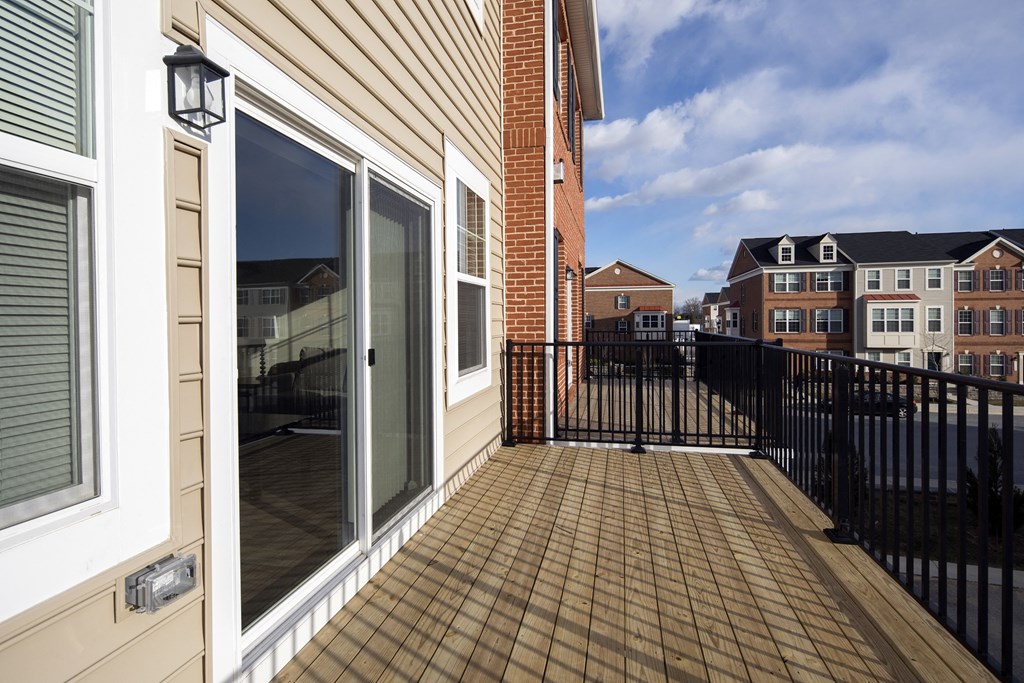 the view of the balcony from the back of the house
