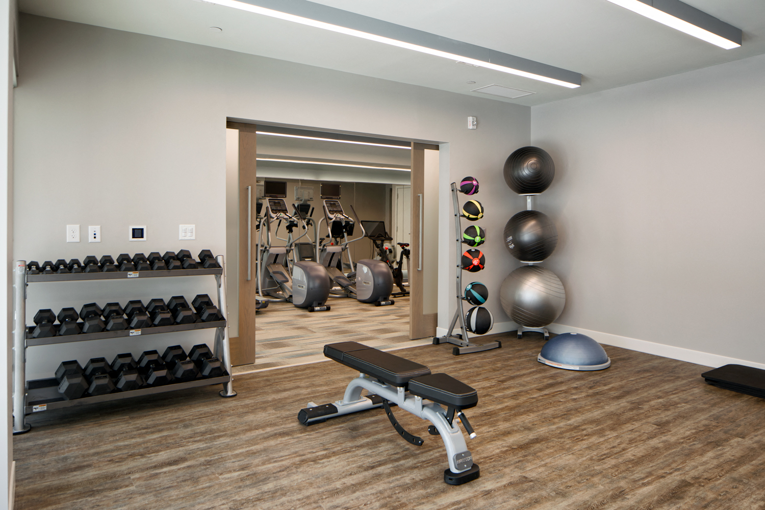 Fitness center designed to help you meet your goals with Precor® equipment, kettle bells, dumbbells, treadmills, ellipticals, Fitness On Demand™ and yoga studio