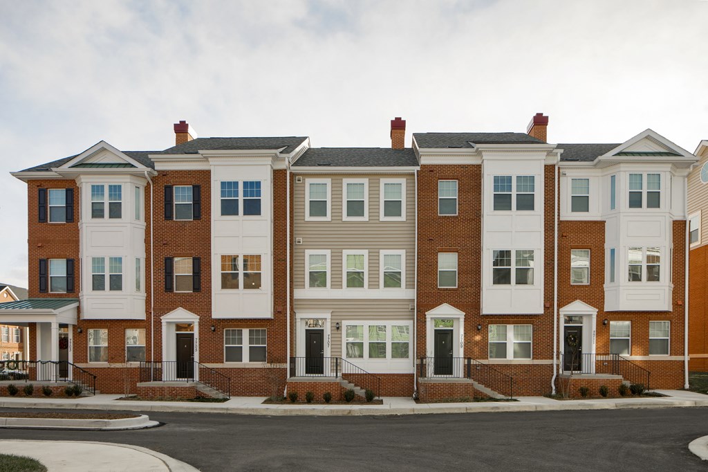 a row of town houses on a street