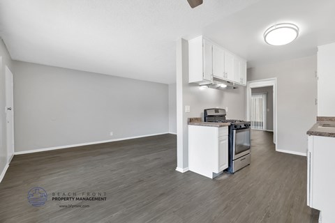 the kitchen and living room of an open floor plan