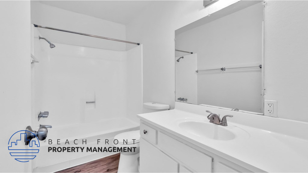 a bathroom with a sink and a mirror and a shower