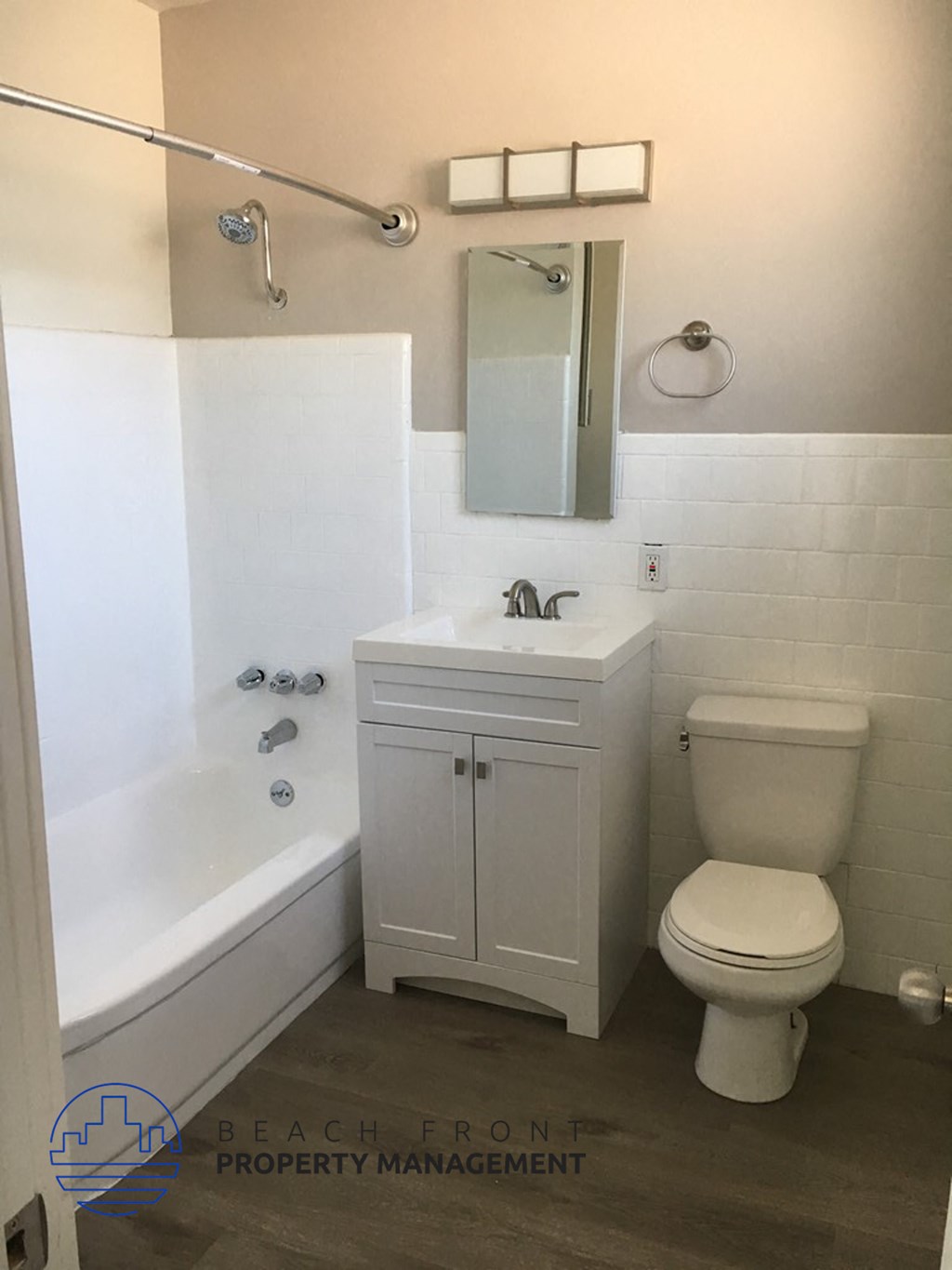 a small bathroom with a sink toilet and bath tub