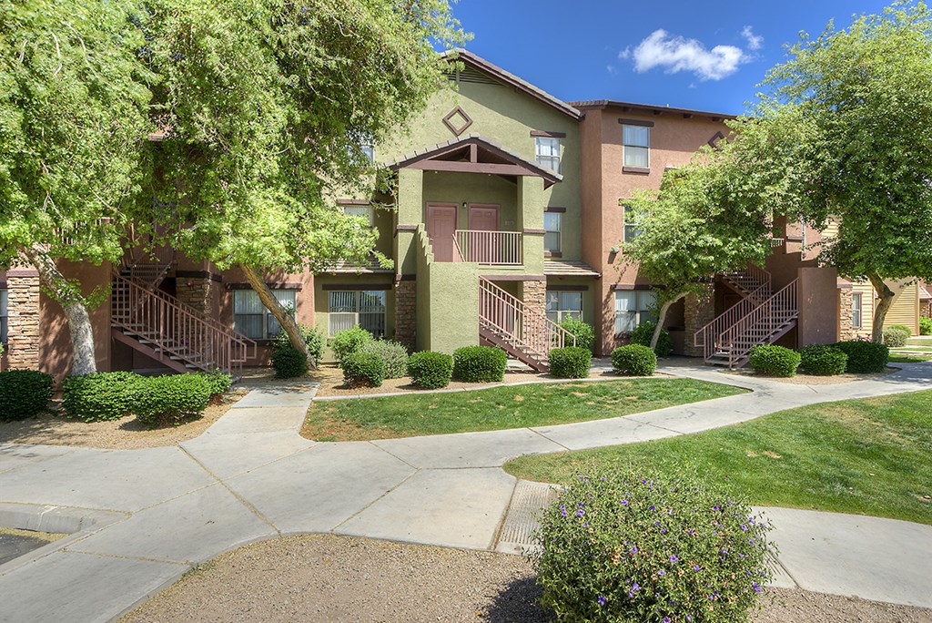 our apartments have a spacious courtyard with trees and grass