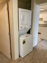 a white washer and dryer in a room