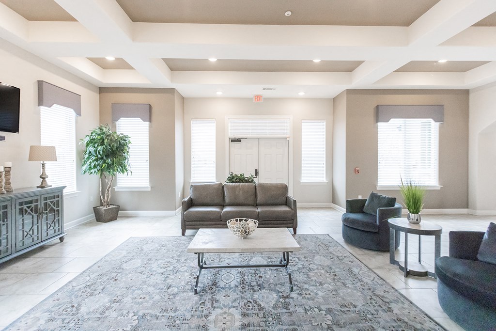 a living room with couches and a coffee table