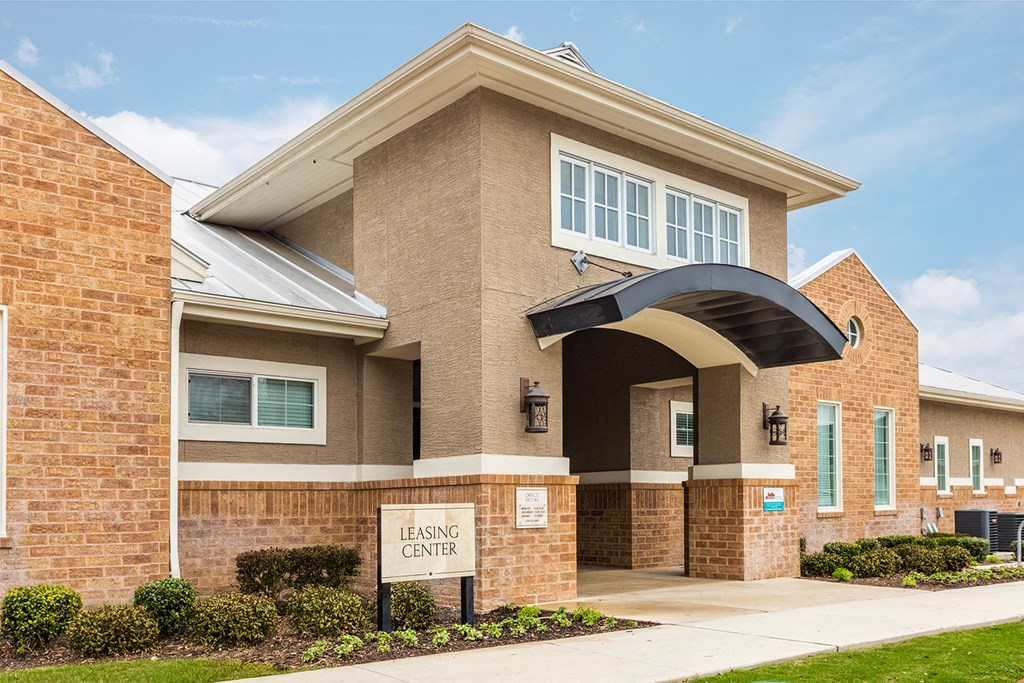 a building with a home care sign in front of it