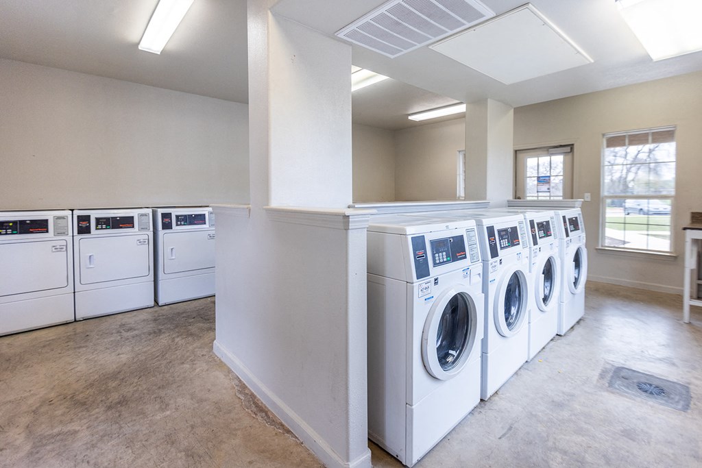 the preserve at ballantyne commons laundry room with washes and dryers