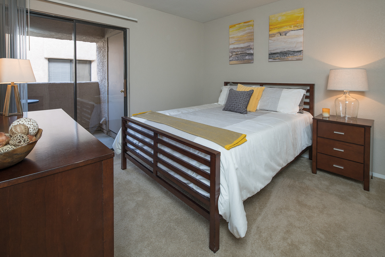 Bedroom with sliding glass doors to balcony