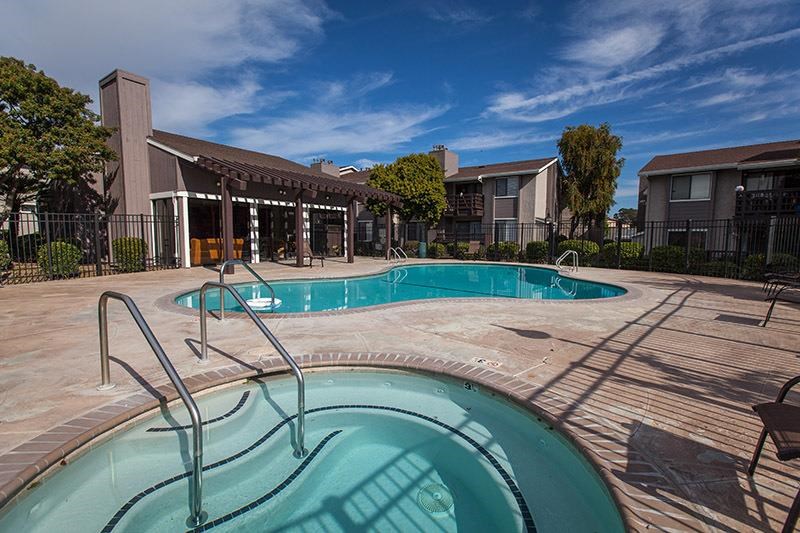 a swimming pool and a spa in a building