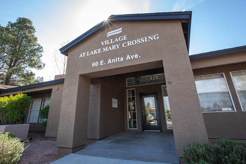 the facade of the village at lake maria crossing office building