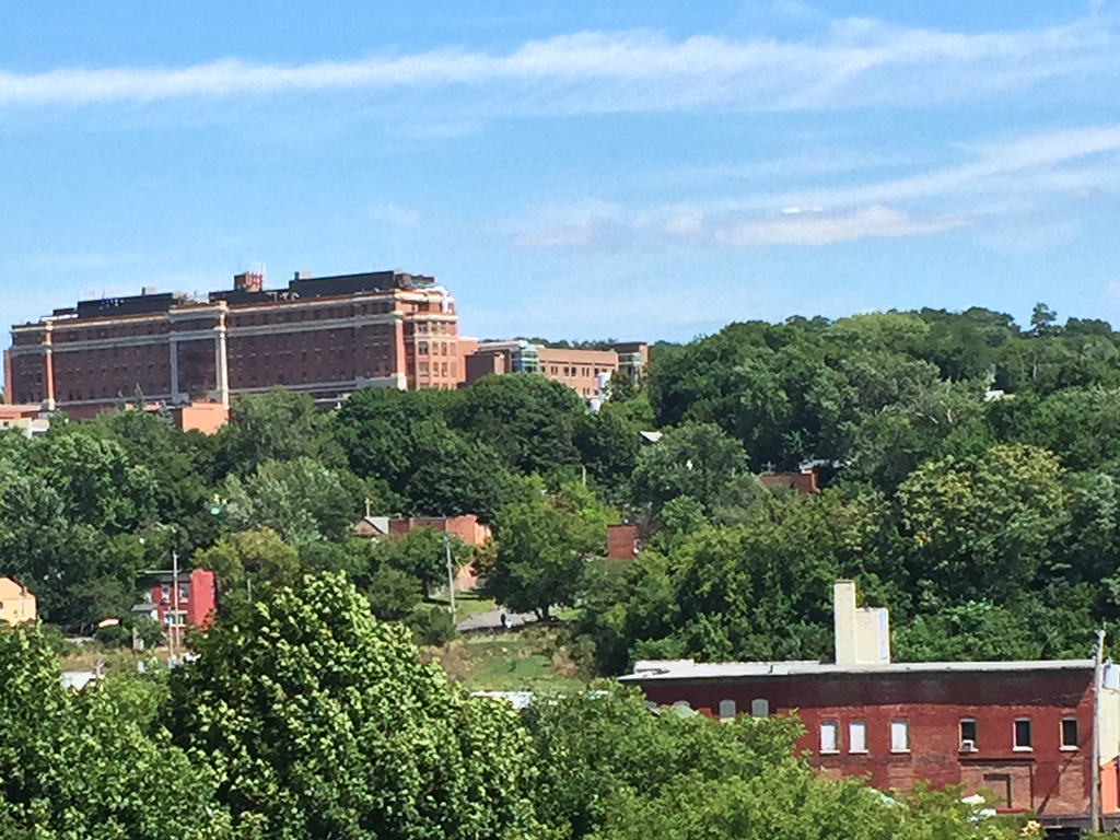 a view of the city from the roof of a building
