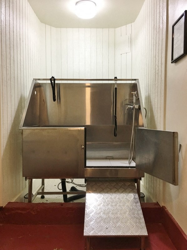 a large stainless steel sink in a room