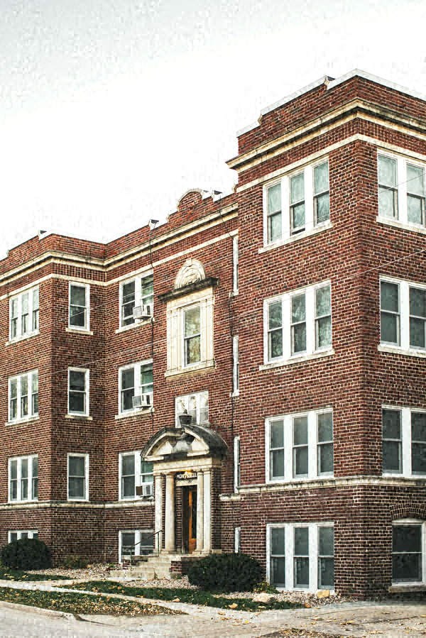 a red brick building with a clock tower