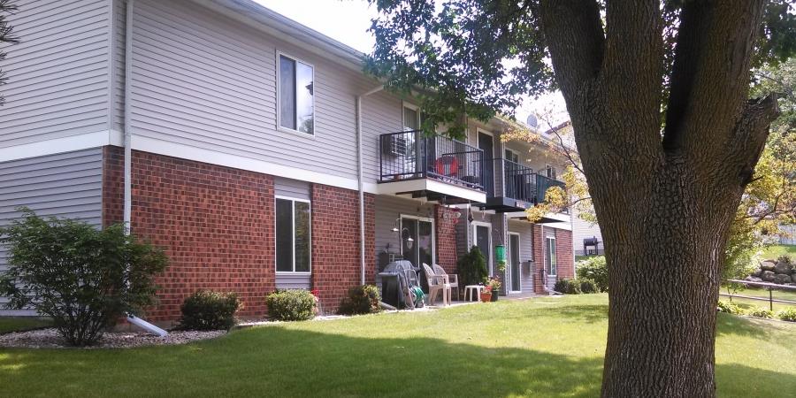a house with a tree in front of it