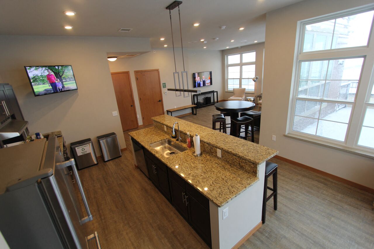 a kitchen with a granite counter top