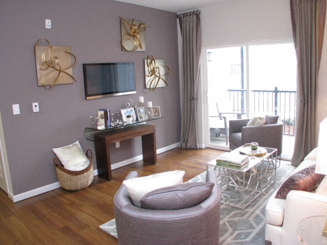 a living room with a couch and a television