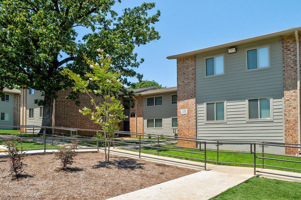 our apartments have a fenced in area with a tree