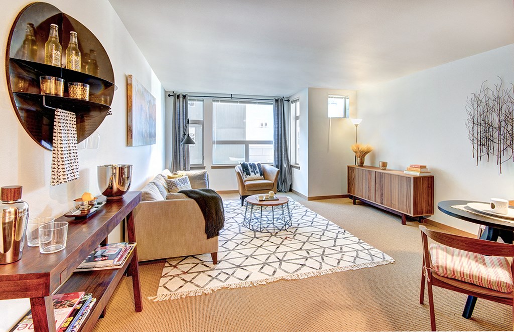 a living room with a couch and a table