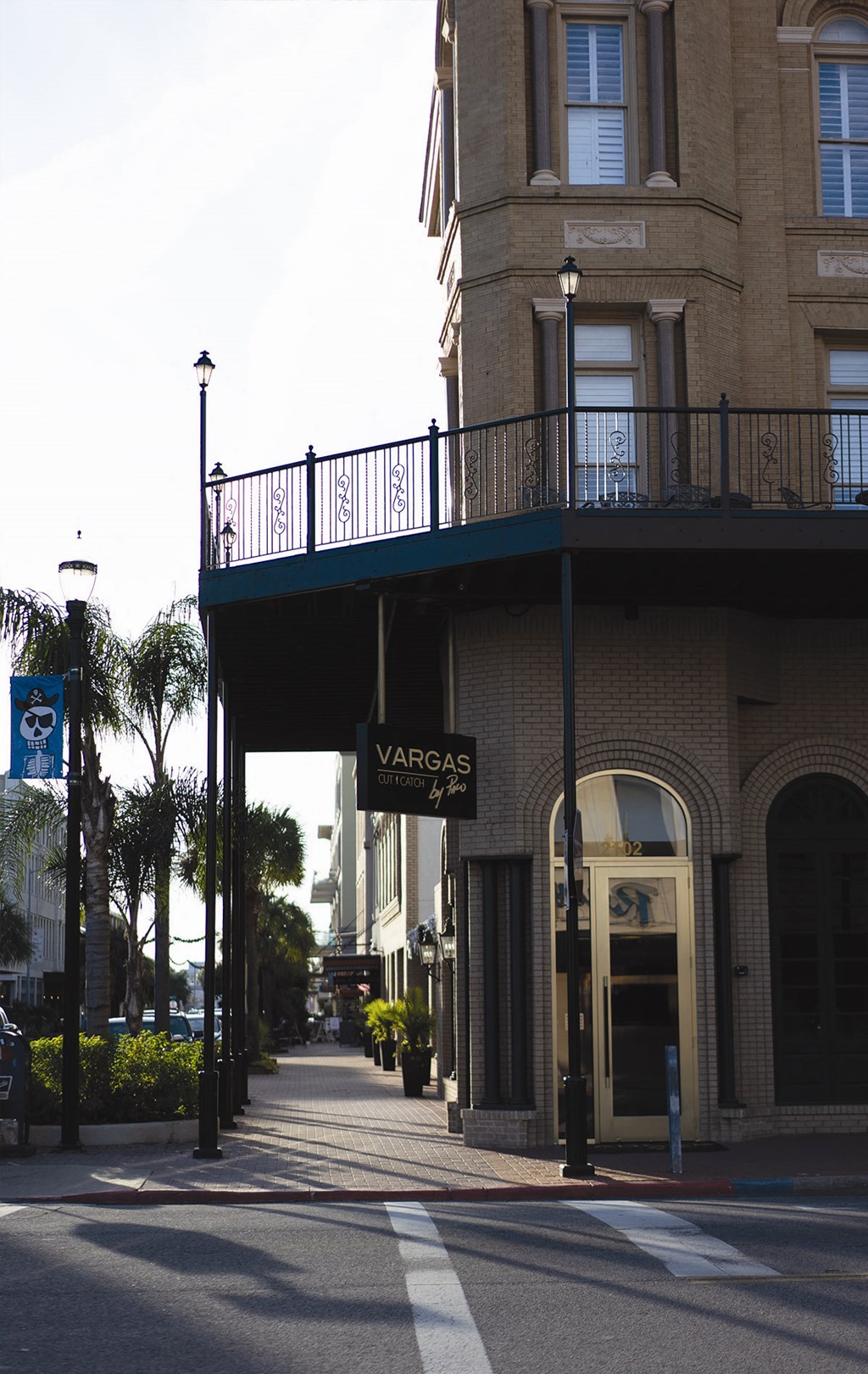 a building with a balcony on a city street