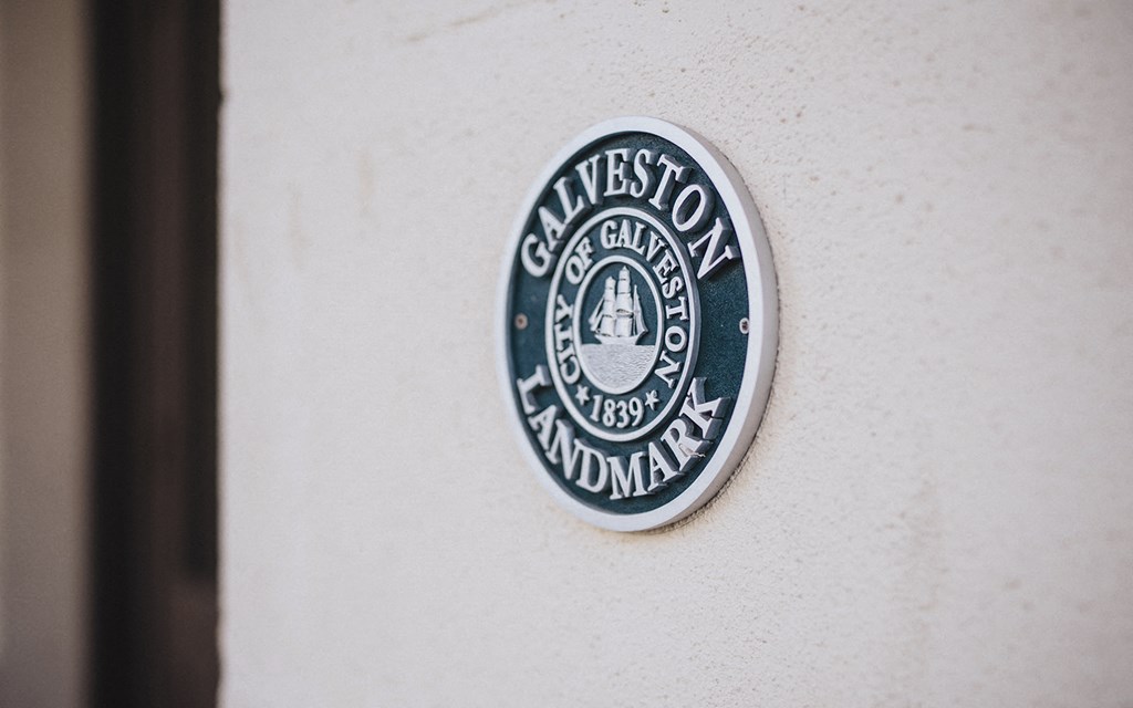 a badge on the side of a building