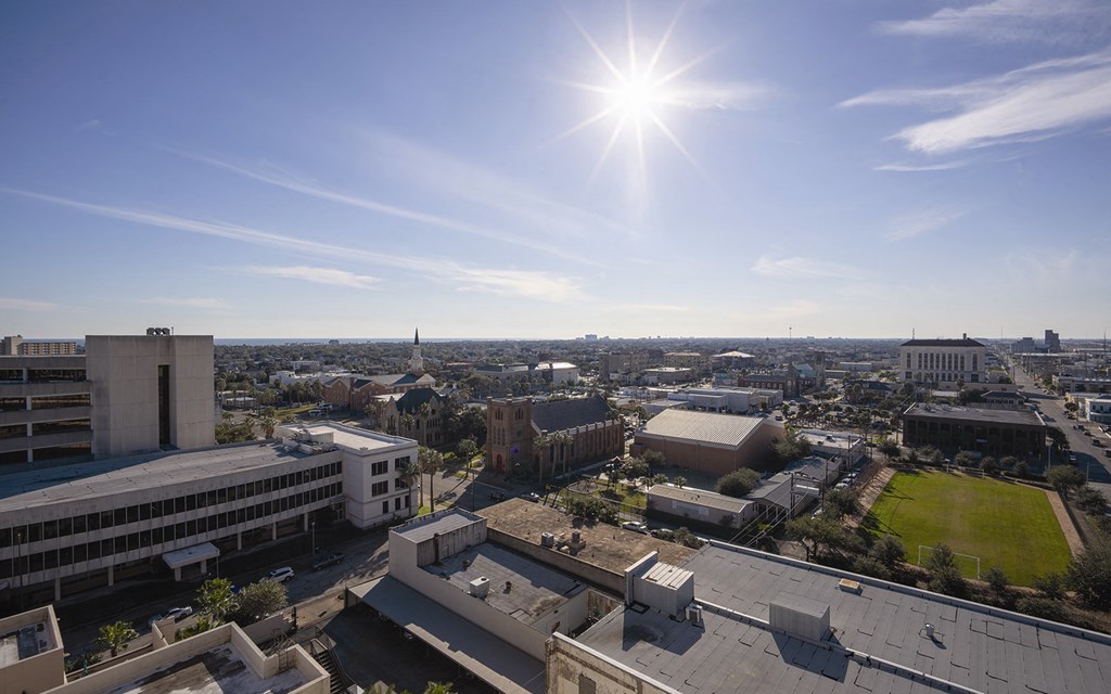 a view of the city from the roof of a building