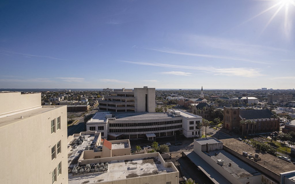 a view of the city from the roof of a building