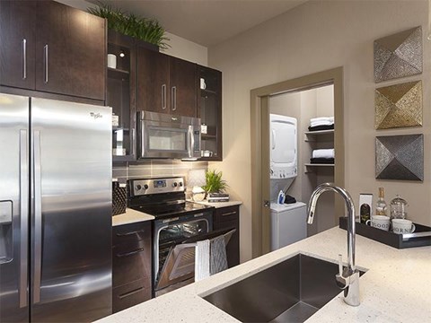 Fully equipped kitchen at ALARA Union Station Apartment Homes, 1975 19th Street Denver