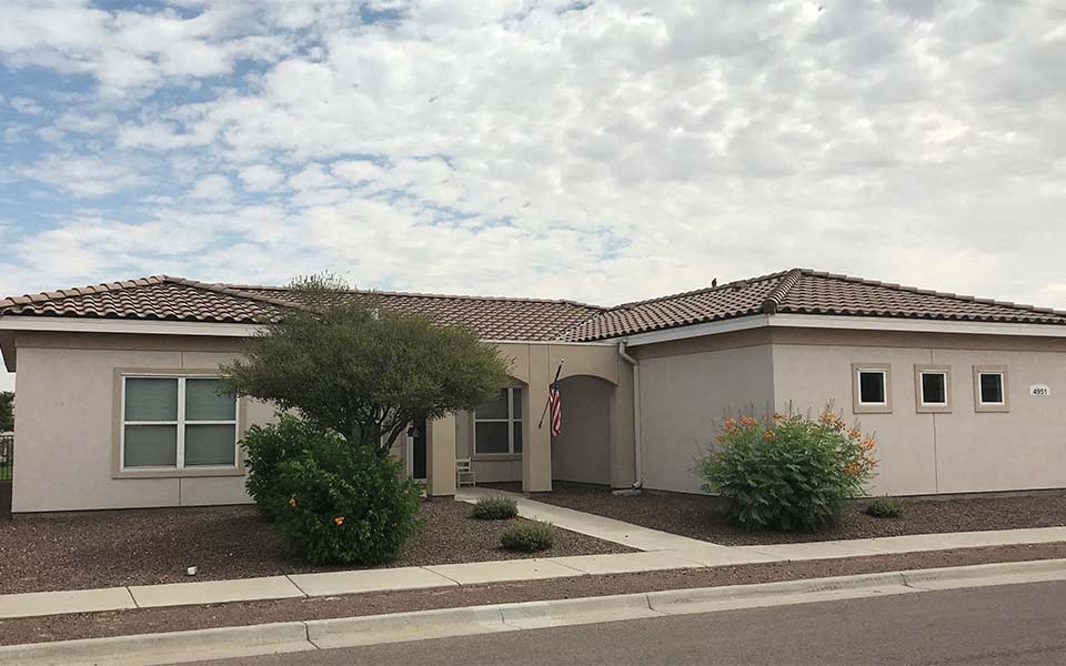 a house with an flag in front of it