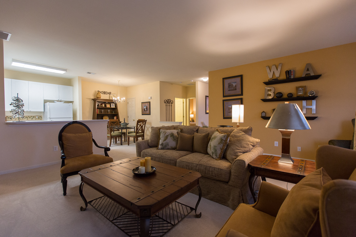 a living room with a couch and a table