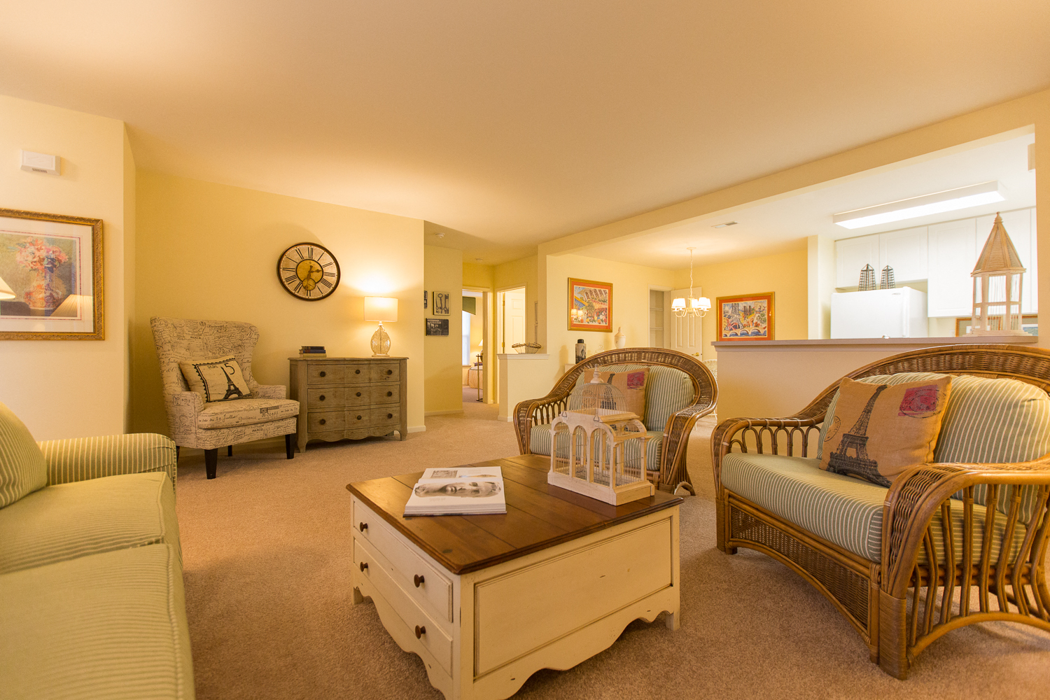 a living room with couches and chairs and a coffee table