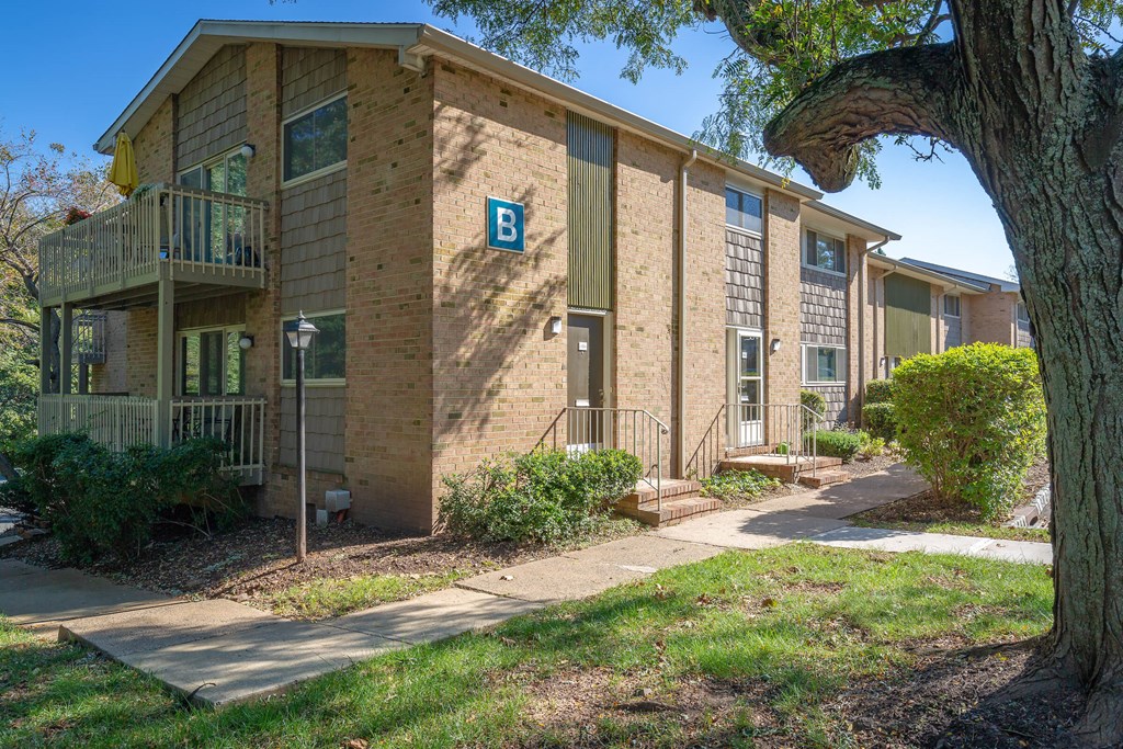 a brick building with a b on the side of it