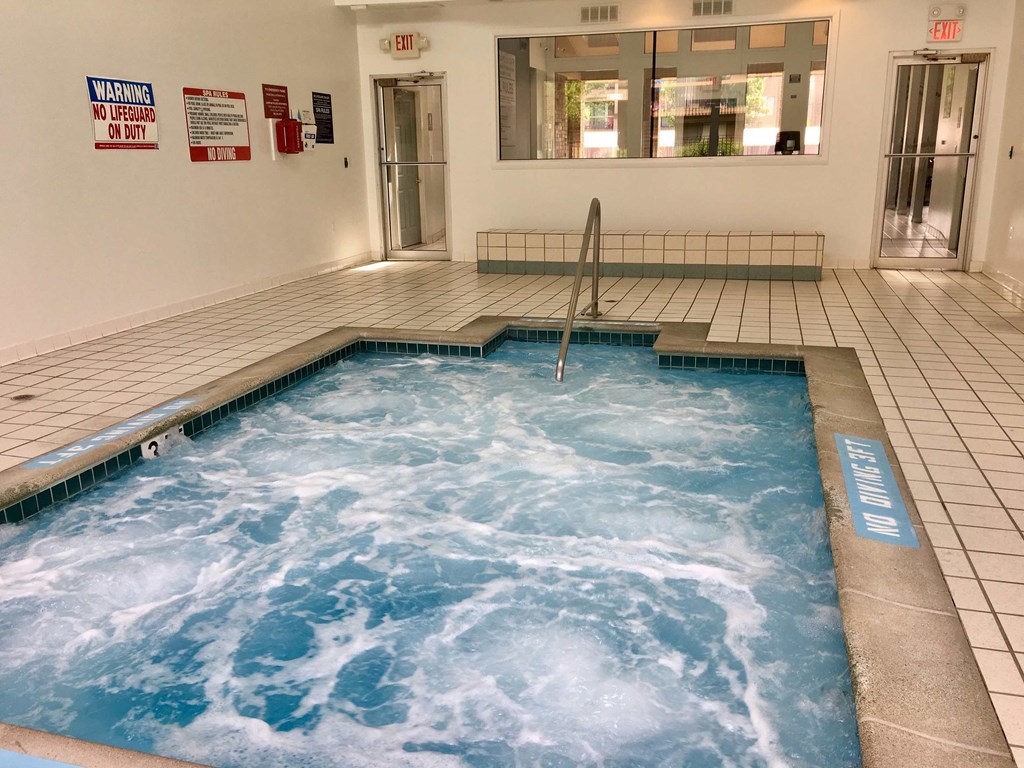a large hot tub in a indoor jacuzzi
