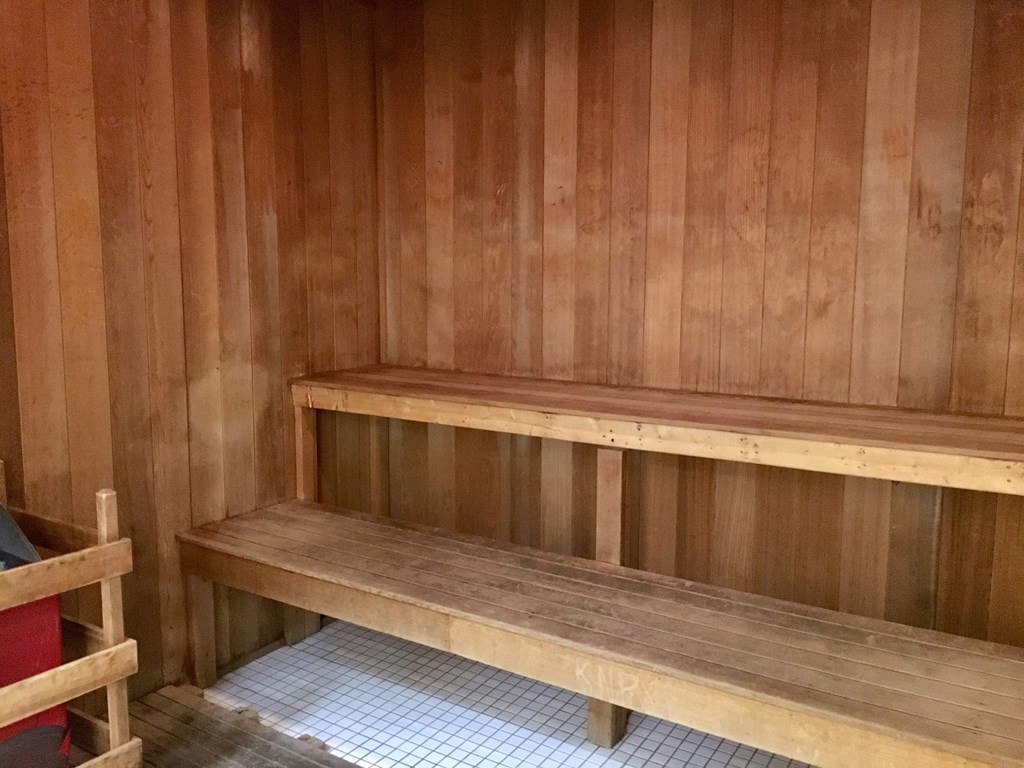a wooden sauna with wooden benches