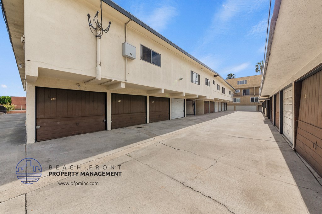 a row of garage doors on the side of a building
