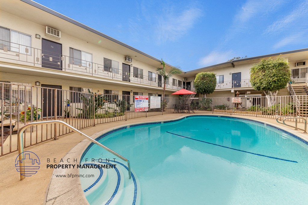the swimming pool at the beach club resort and spa
