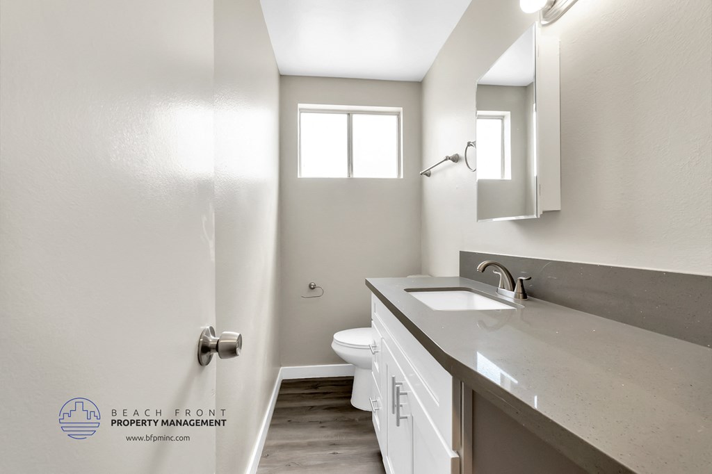 a bathroom with a sink and a toilet