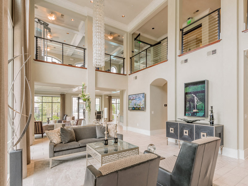 the living room is open to the dining room and kitchen