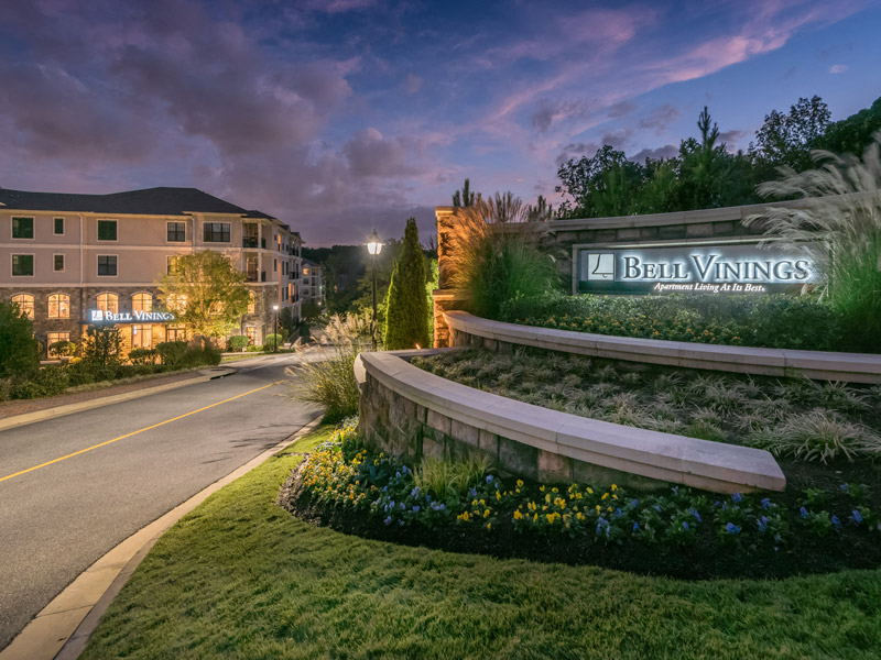 the sign for bell vistas at night at the entrance to bell vineyards
