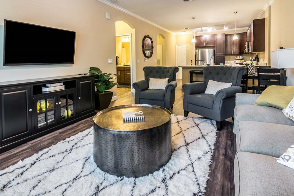 Living Room With Kitchen View at The Oasis at Lake Bennet, Ocoee, 34761
