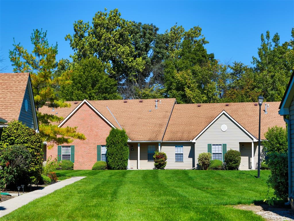 a house with a lawn in front of it